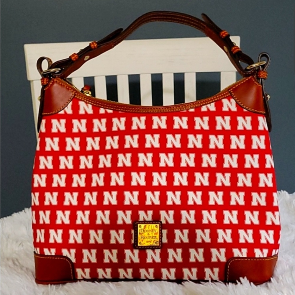 Dooney & Bourke NCAA Huskers Hobo-Style Purse.